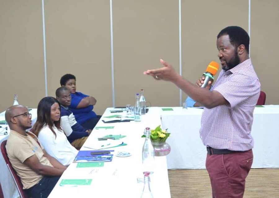 Benson Mukandiwa facilitating a workshop with seated participants