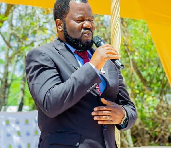 Benson Mukandiwa speaking at an outdoor professional event